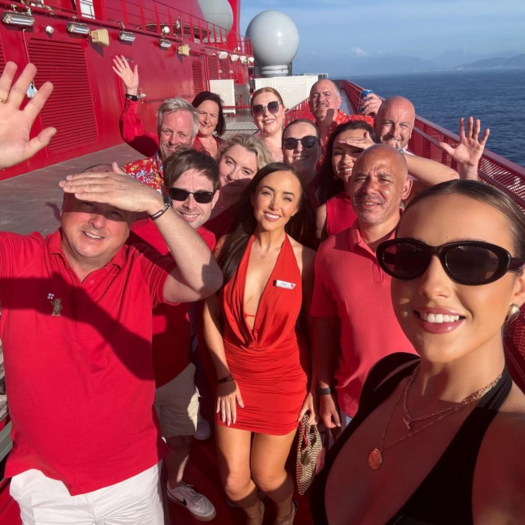 Virgin Voyages First Mates including Daniel Griese onboard celebrating the 2025 top bookers incentive cruise at sea